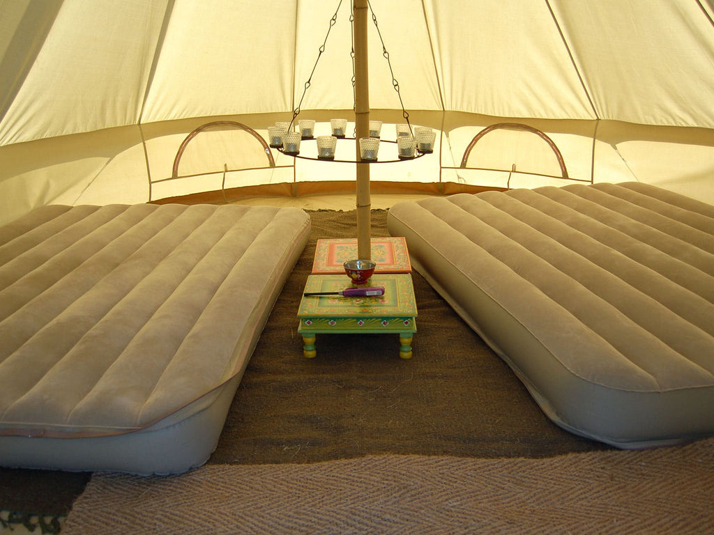 2 double inflatable mattresses inside a 4m deluxe bell tent