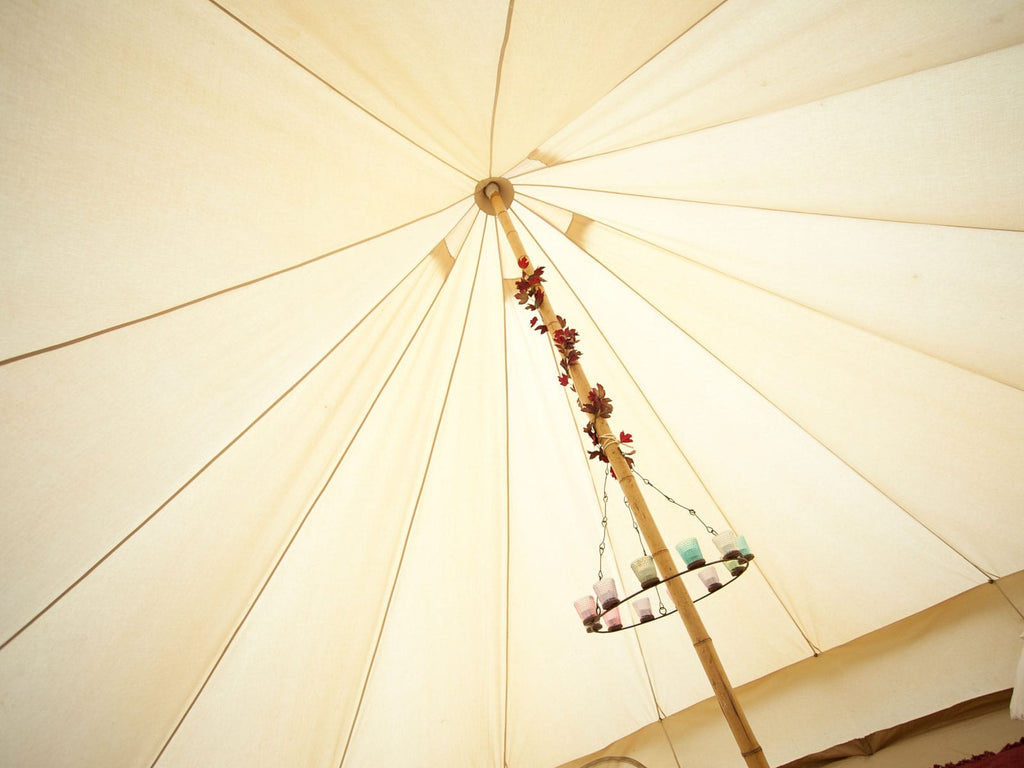 Cotton canvas ceiling of a 5m deluxe bell tent with bespoke bamboo centre pole
