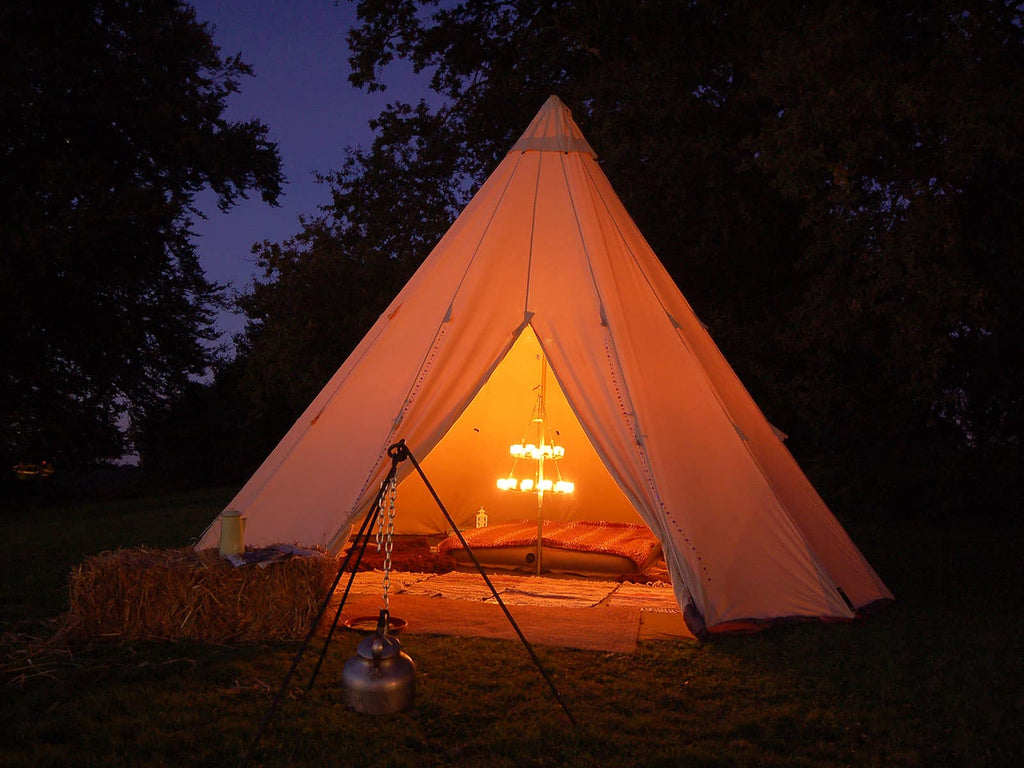 5m ultimate single pole tipi with double tea light chandelier at night 