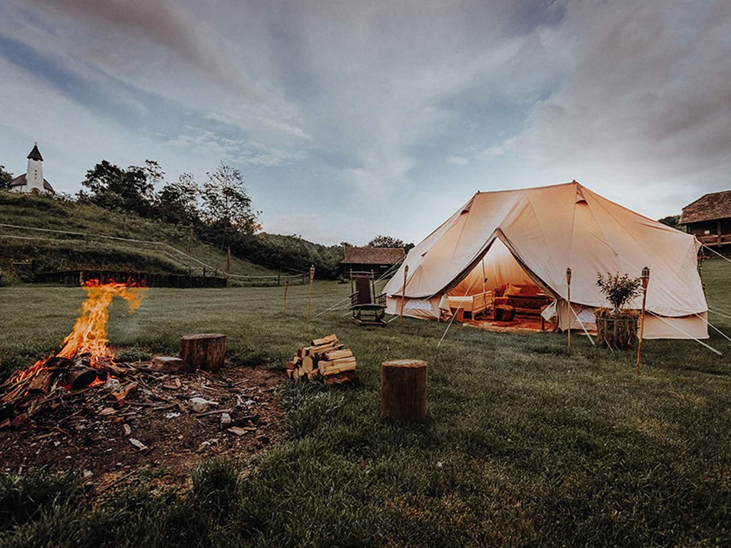 Emperor ultimate bell tent next to fire pit
