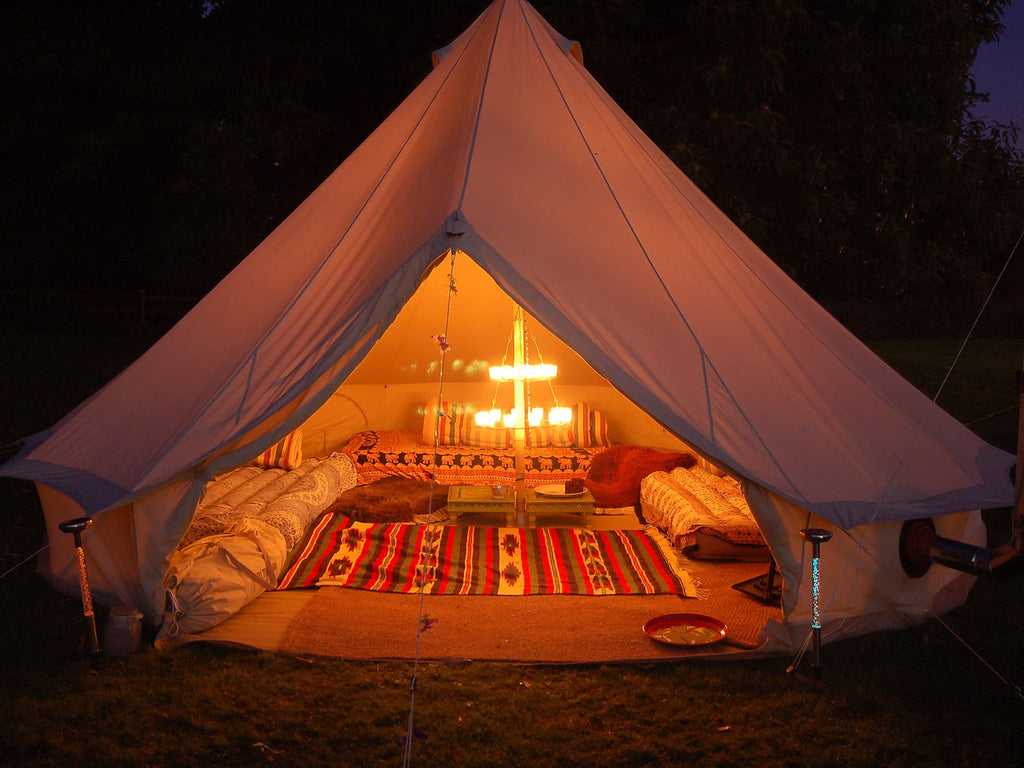 Furnished bell tent with double tier tea light chandelier