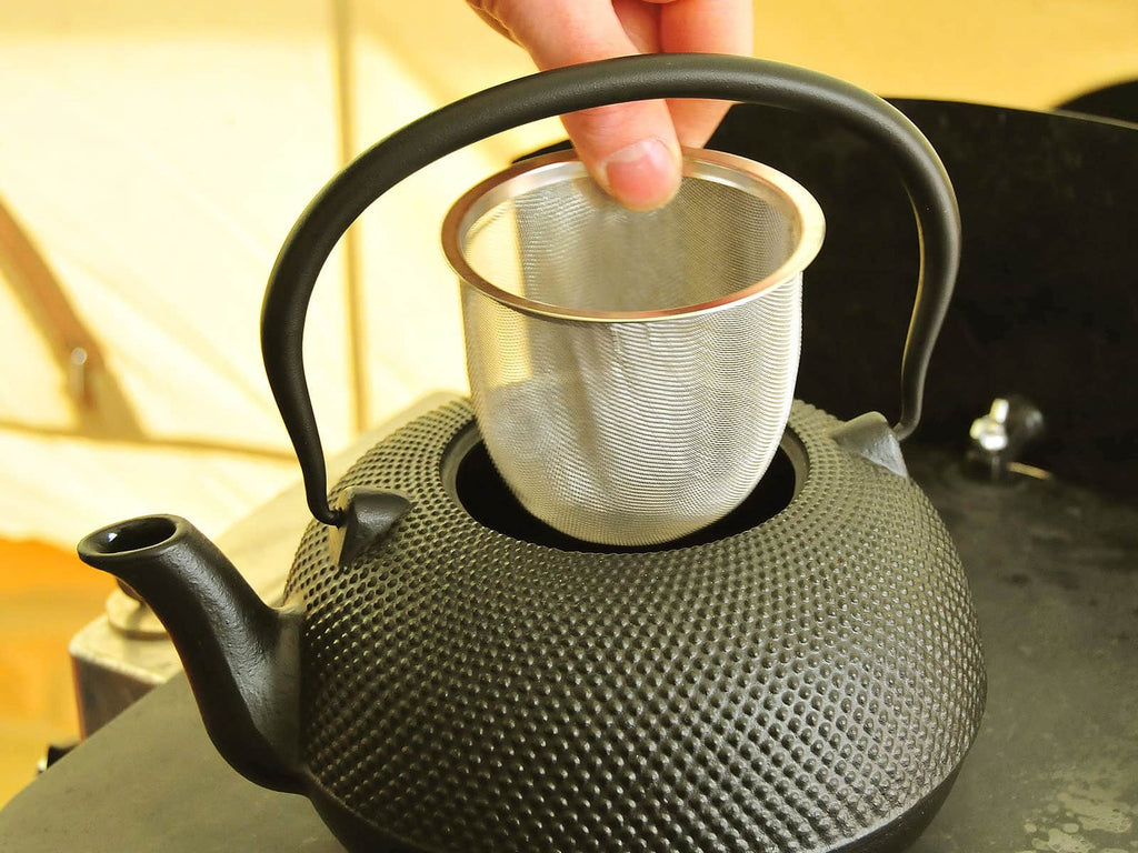 Cast iron tea kettle tea strainer