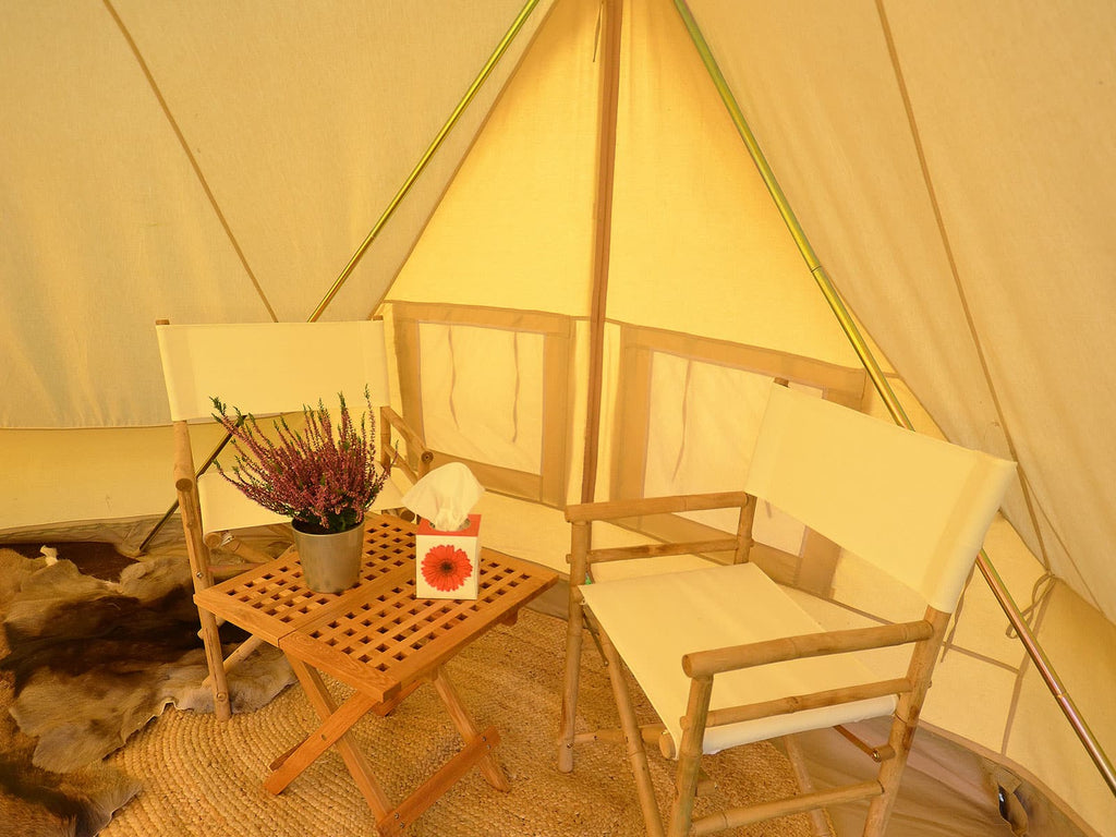 Interior of an ultimate emperor bell tent with with table and chairs