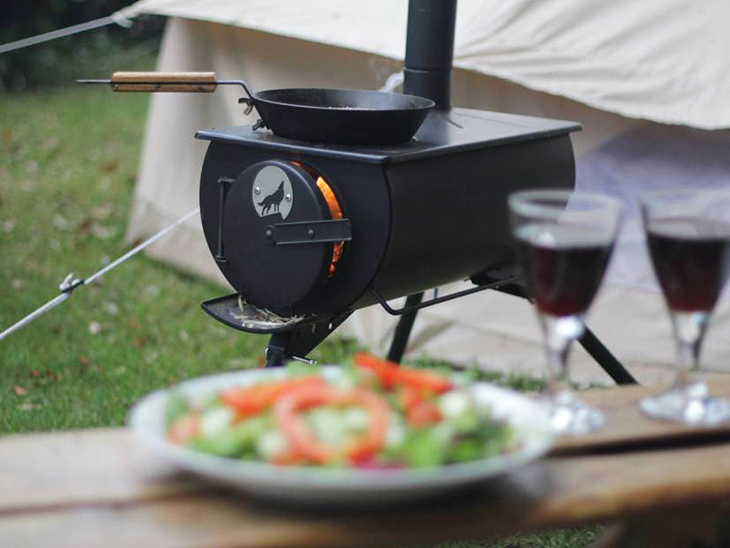 Frontier stove in front of a bell tent