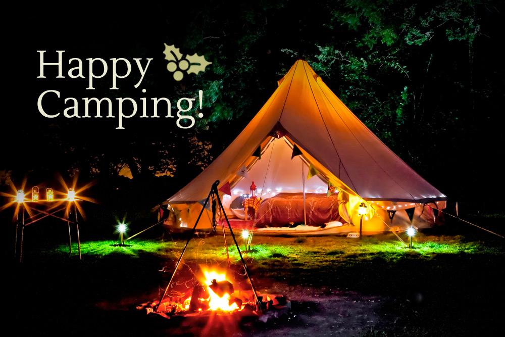 Bell tent and firepit in the night at christmas time
