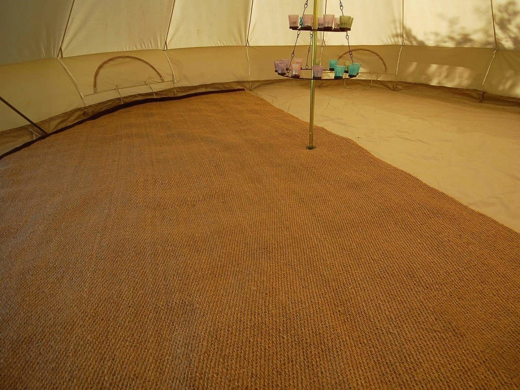 4.5m half moon coir matting in a bell tent
