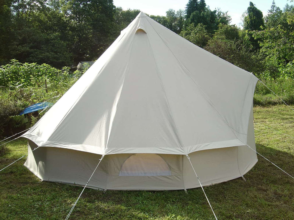 Side view of a 4m standard bell tent with the side wall pegged down
