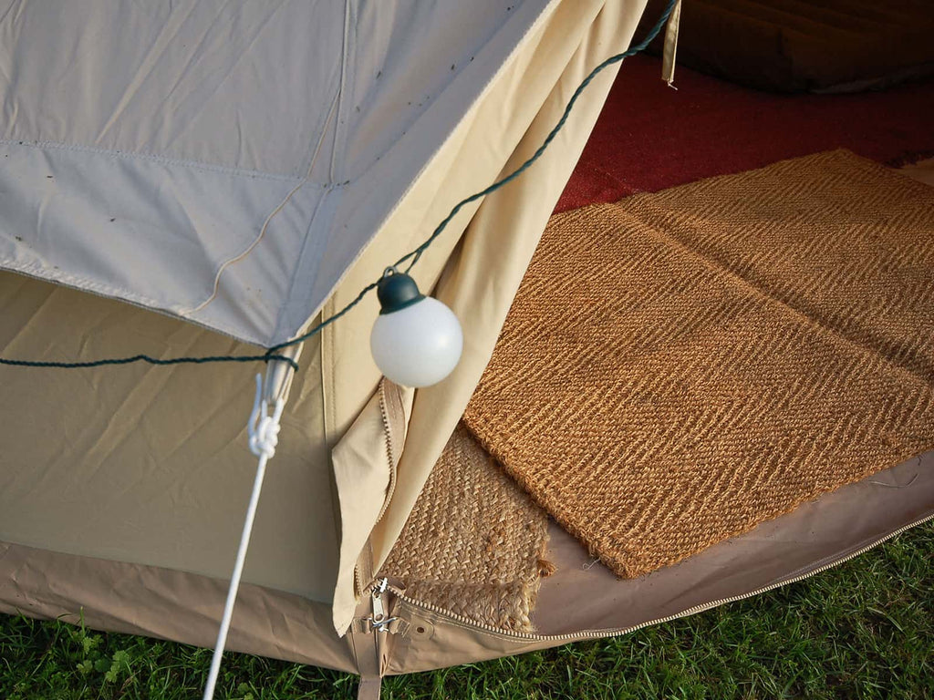 Deluxe bell tents have integrated sewn-in groundsheets