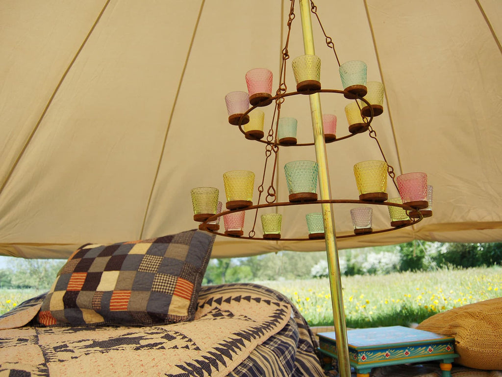 Inside a 4m standard bell tent with the walls rolled up