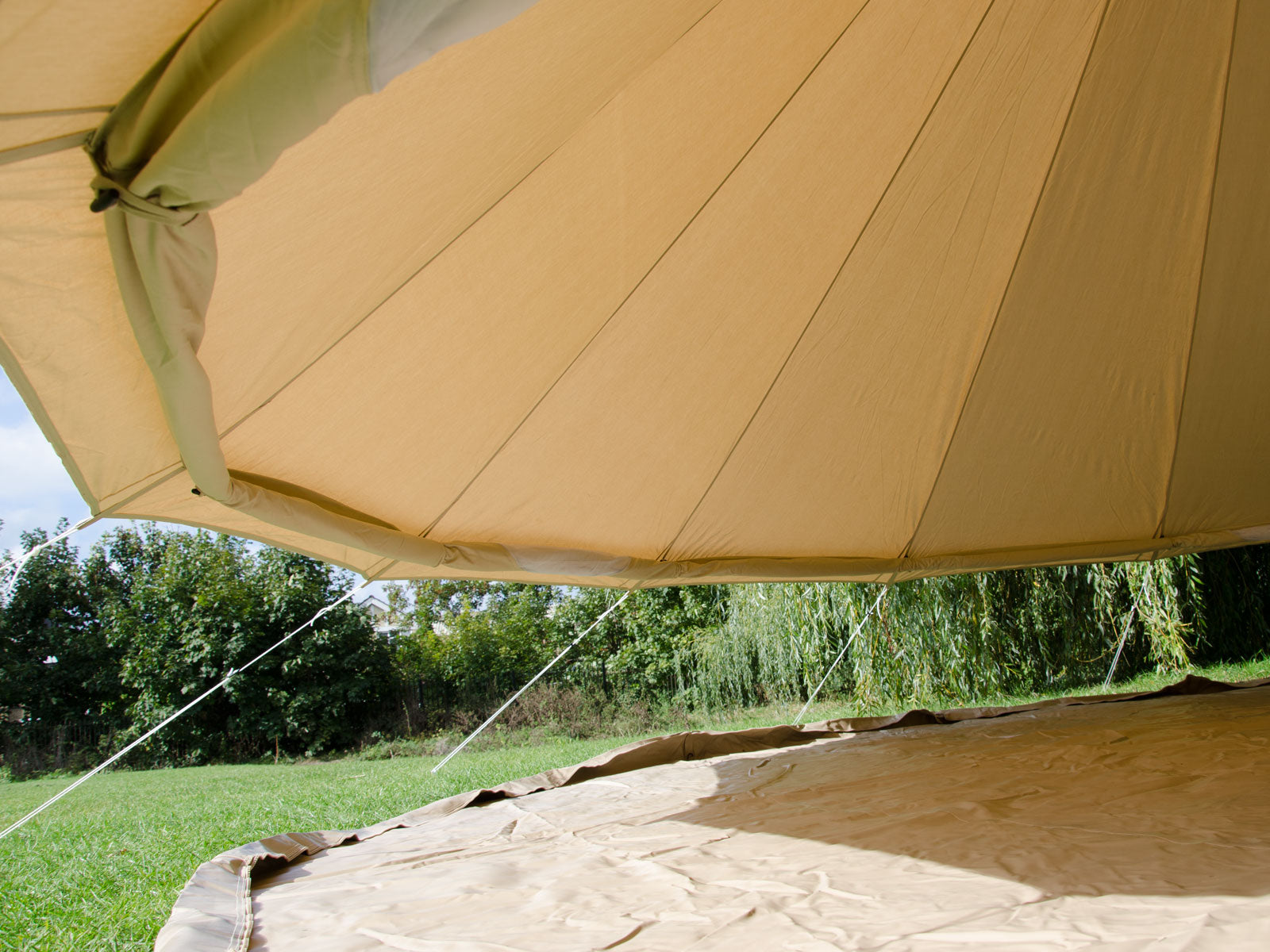 Rolled up walls feature of 5m zig bell tent