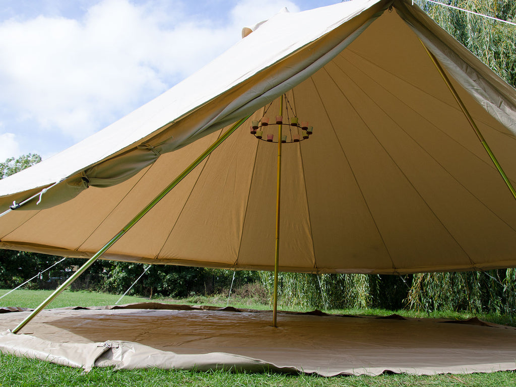 5m ultimate bell tent with walls rolled up and tea light chandelier