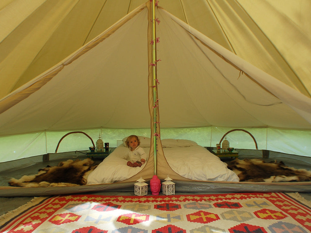 5m inner tent sleeping area inside a bell tent with the walls rolled up