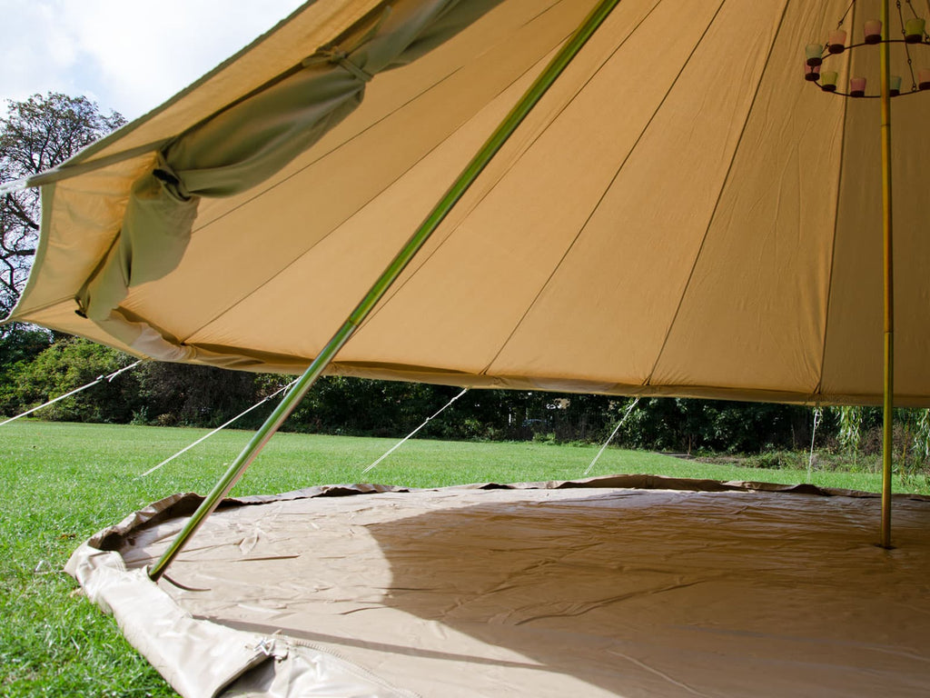 Inside 5m ultimate bell tent with walls rolled up