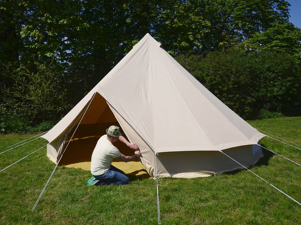 Person opening the door of a 6m standard bell tent