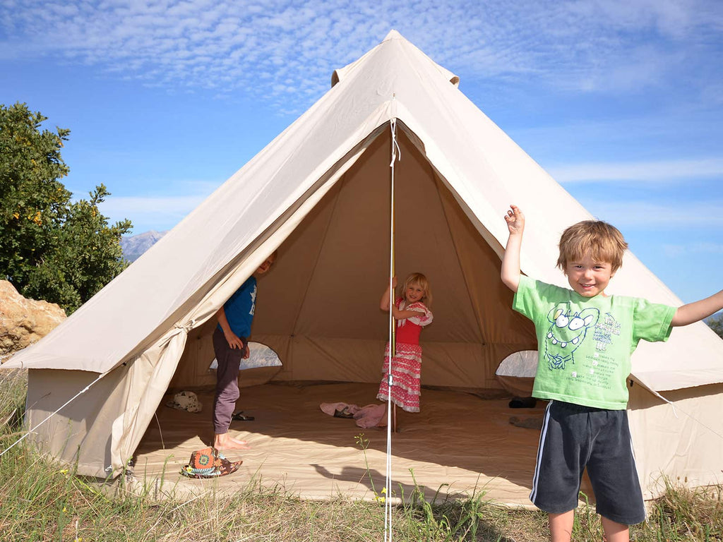 Kids playing inside a 4.5m ultimate bell tent