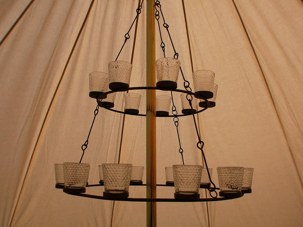 Double tier clear glass tea light chandelier in a bell tent
