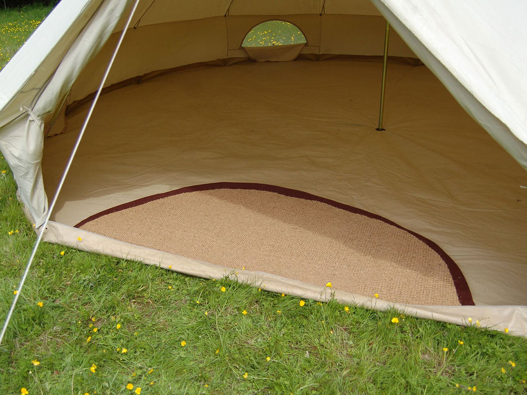 Coir door mat at the entrance of a bell tent