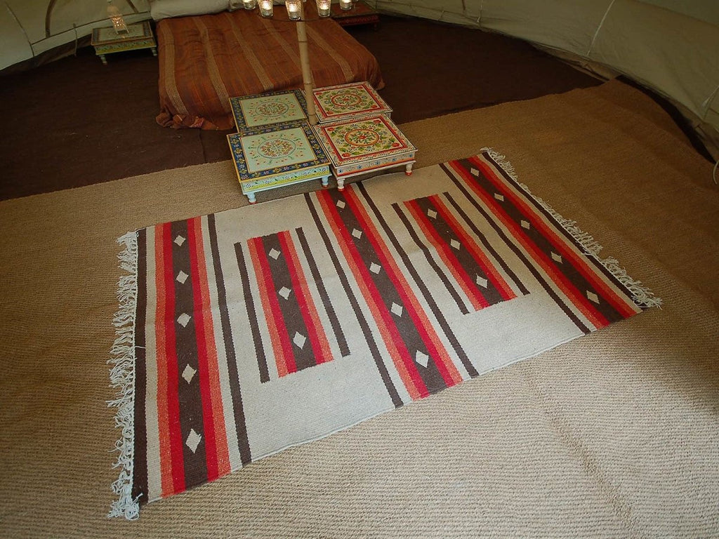Moroccan handloomed rug inside a bell tent