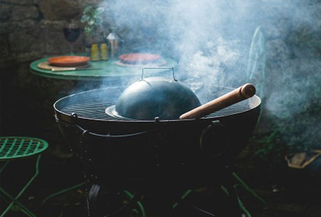 Kadai roasting pan and lid on a kadai firebowl