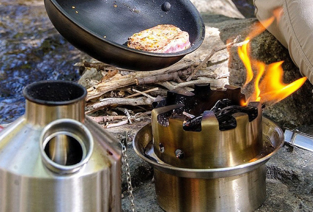 Cooking with a large kelly kettle hobo stove