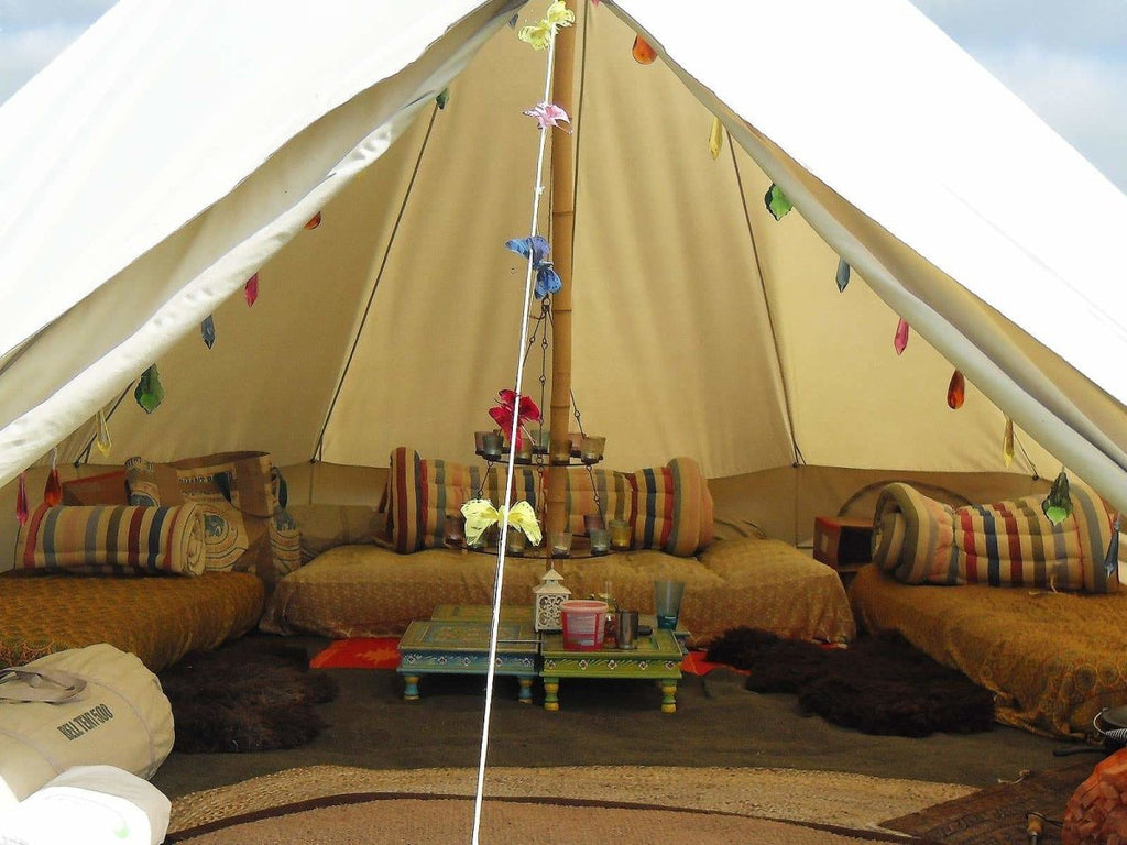 Roll up cotton mattresses used as bolsters in a bell tent
