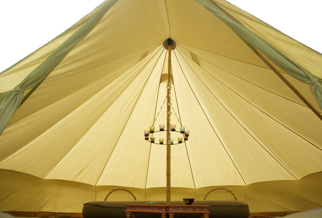 Single tier multi coloured glass tea light chandelier in a 5m bell tent